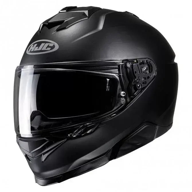 HJC i71 integraalhelm in mat zwart met geïntegreerd zonnevizier en modern design.